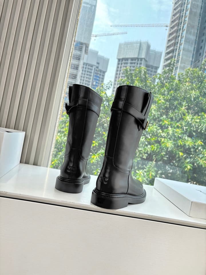 Celine Triomphe Knight Ankle Boots – 2025 Fall/Winter Collection in Black And Brown Leather Display