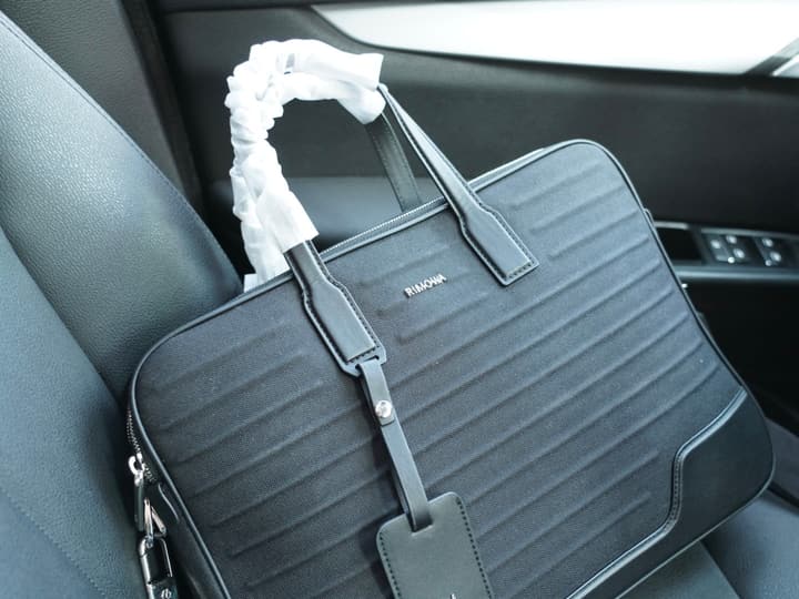 RIMOWA High-Version Crossbody Backpack in Matte Black Briefcase