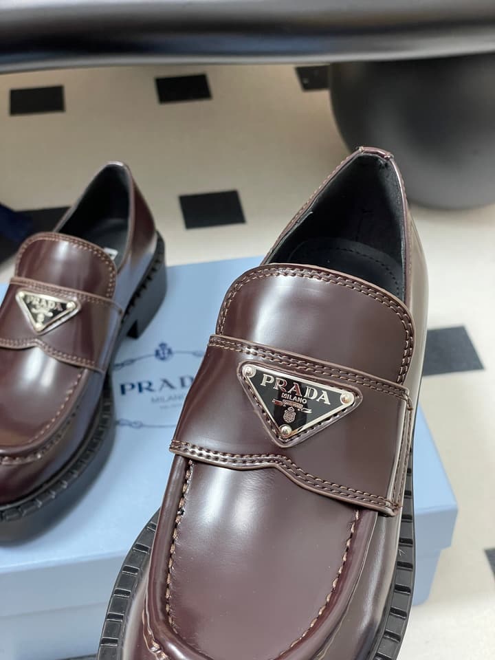 Prada Triangle Logo Platform Loafers in Black