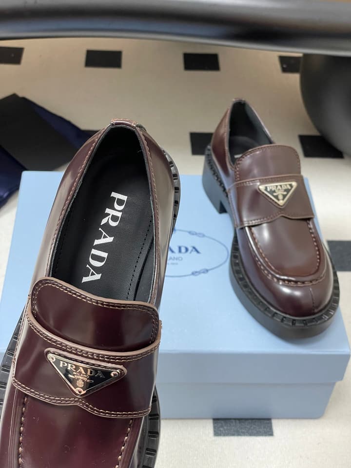 Prada Triangle Logo Platform Loafers in Black
