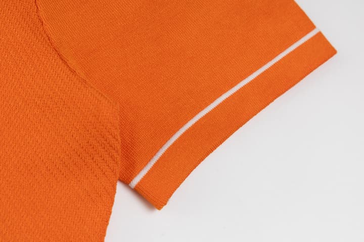 Hermès Retro Knitted Polo Shirt – SS24 in Black Polo With Orange Placket