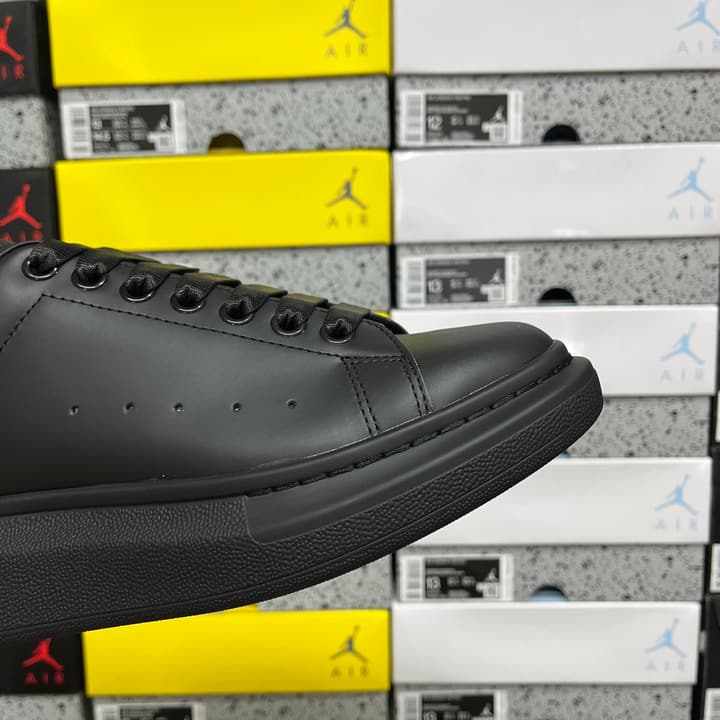 Alexander McQueen Oversized Low-Top Sneakers in All Black With White Sole