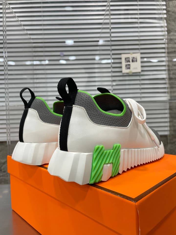 Hermès Sport Sneakers – Iconic Orange Edge in Black Knit With Black Laces