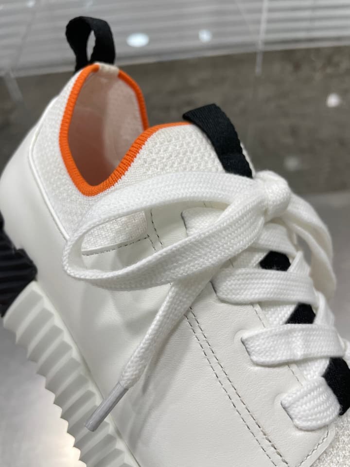 Hermès Sport Sneakers – Iconic Orange Edge in Black Knit With Black Laces
