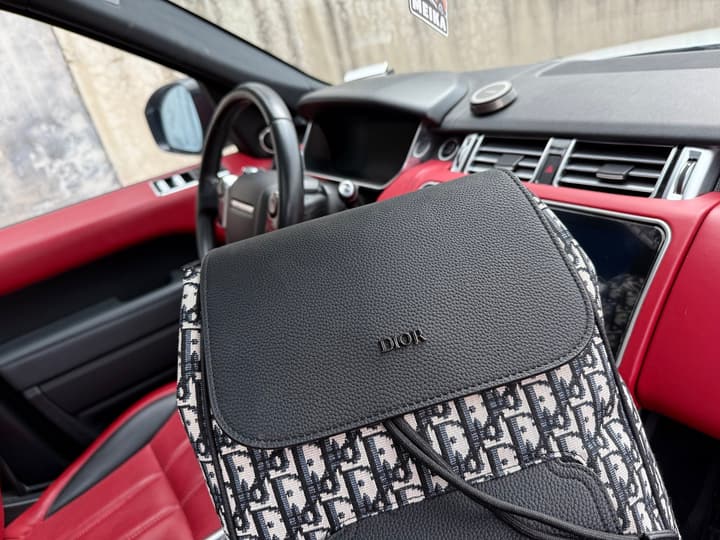 Dior Saddle Oblique Grained Leather Backpack in Beige/Black