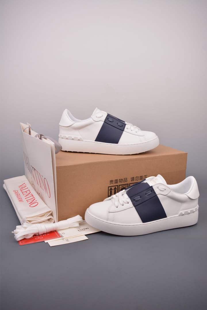 Valentino Rockstud Untitled Rivet Sneakers – 2025 Collection in White With Black Band
