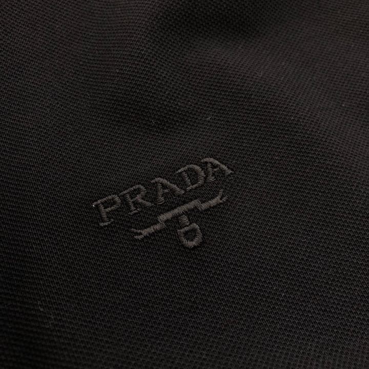 Prada Embroidered Triangle Logo Polo Shirt – 2026SS in Black