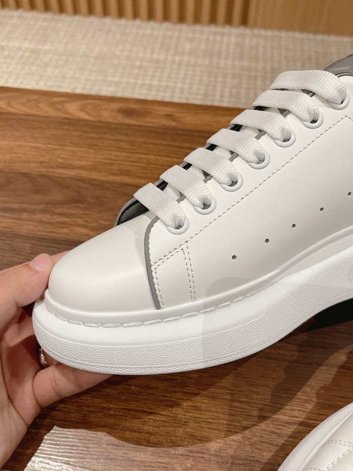 Alexander McQueen Classic Versatile White Sneakers in White With Black Laces & Heel