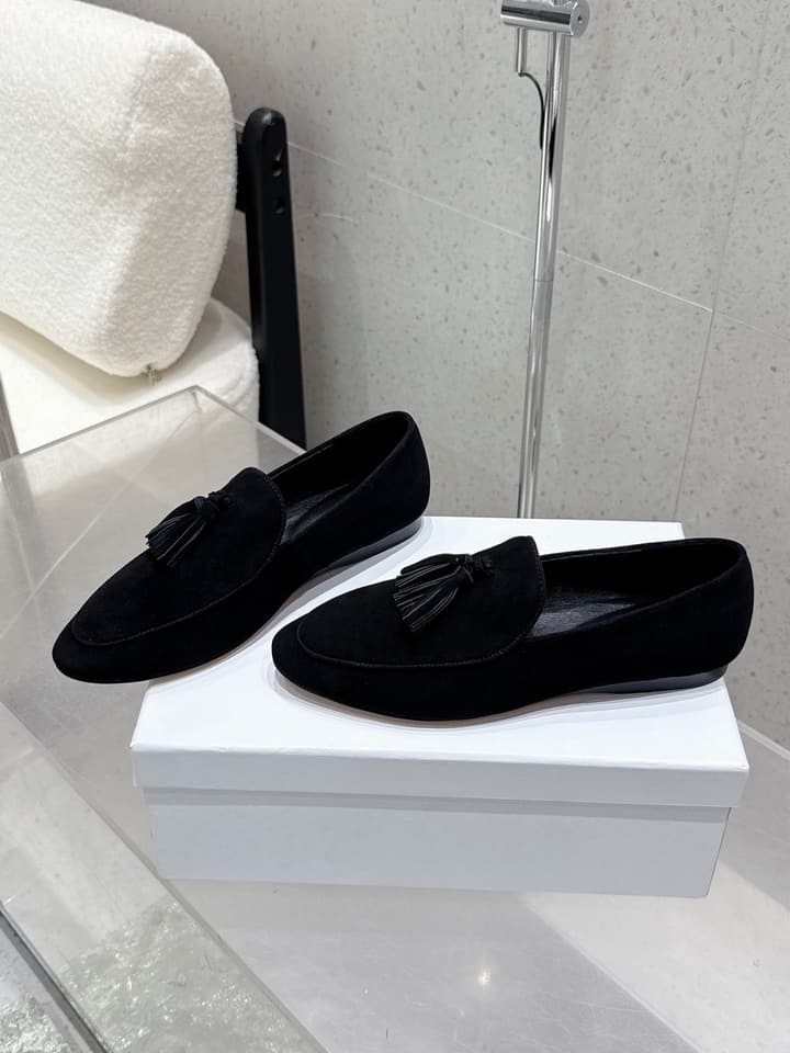 The Row Tassel Loafers in Black Suede
