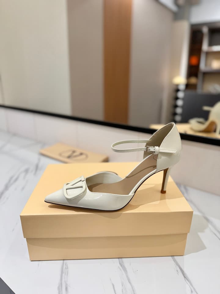 Valentino Garavani VLogo Signature Slingback Sandals in Black