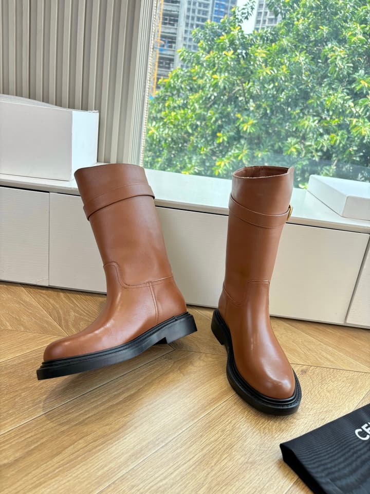 Celine Triomphe Knight Ankle Boots – 2025 Fall/Winter Collection in Black And Brown Leather Display