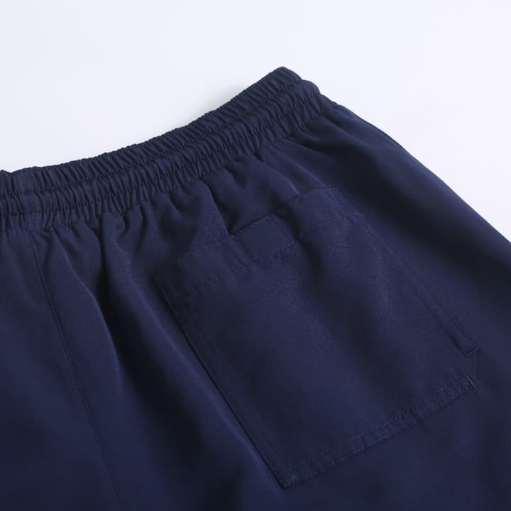 Brunello Cucinelli Embroidered Swim Trunks in Navy Blue