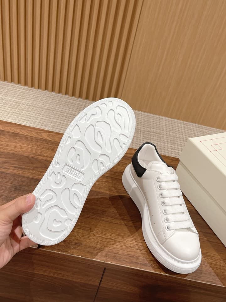 Alexander McQueen Classic Versatile White Sneakers in White With Black Laces & Heel