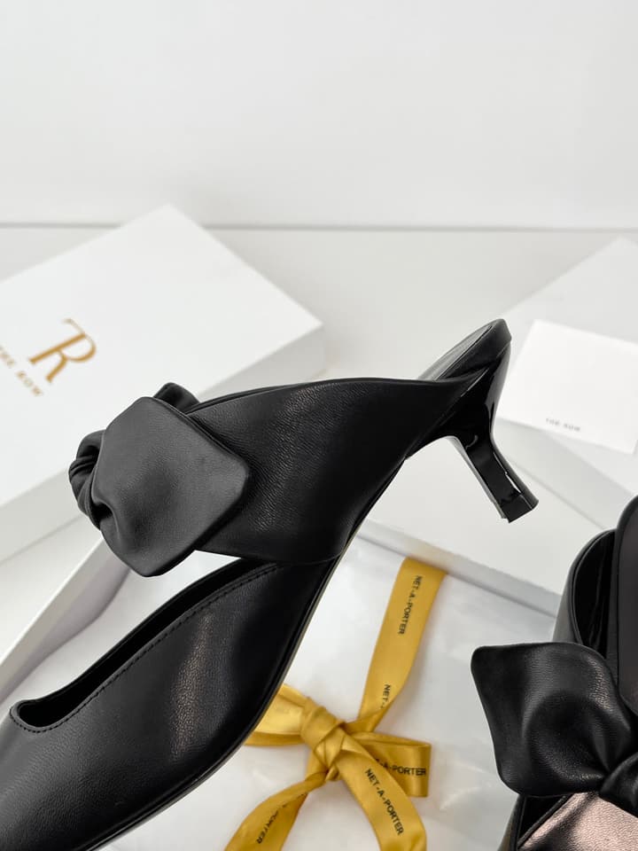The Row Leather Bow Mules in Black Leather