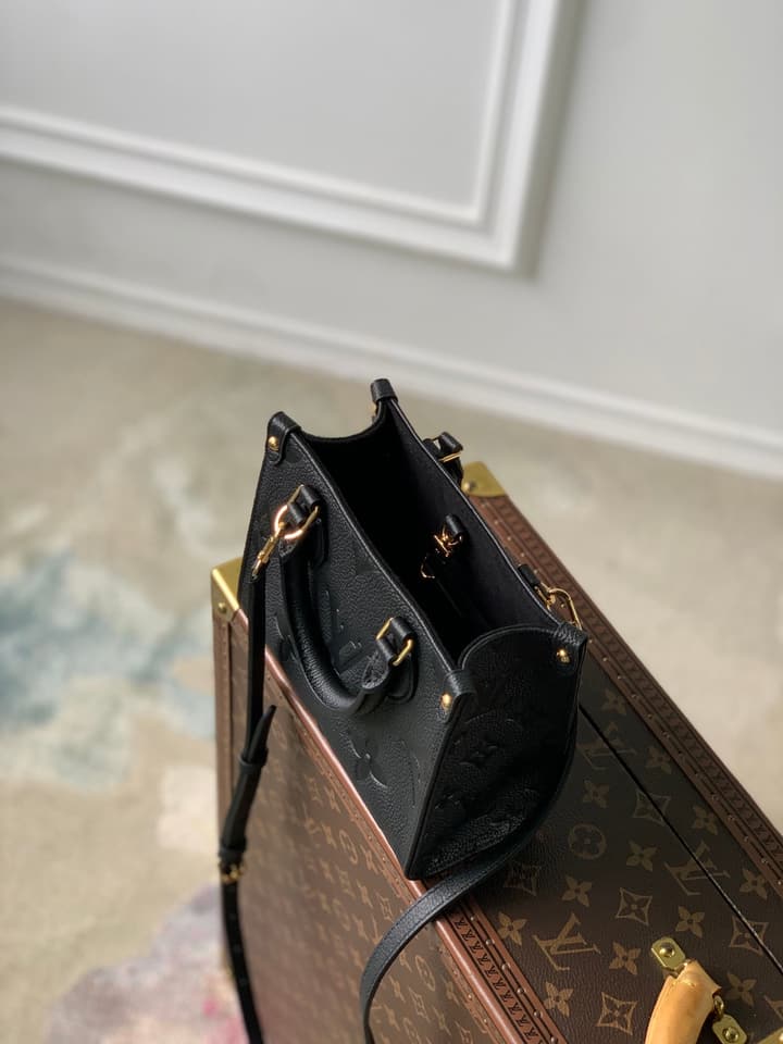 Louis Vuitton OnTheGo BB Monogram Empreinte Handbag in Beige And Cream Monogram