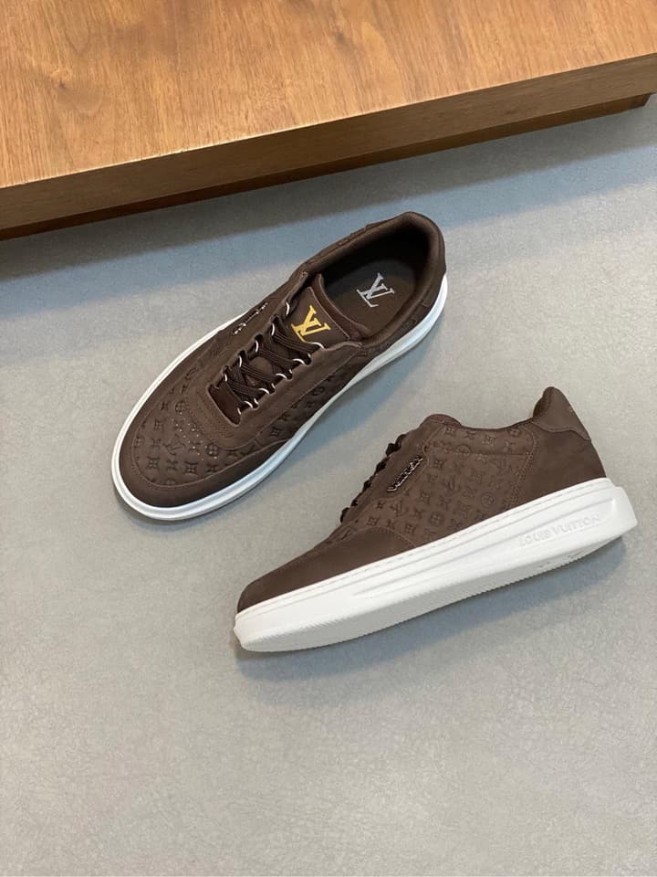 Louis Vuitton Embossed Calfskin Sneakers in Black