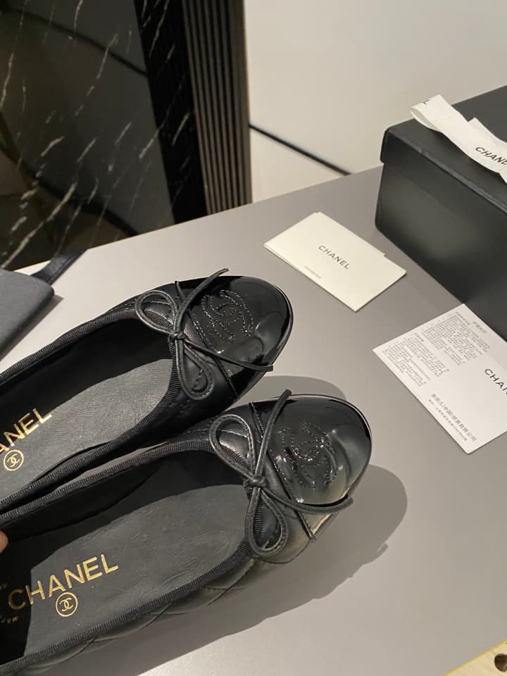 Chanel Classic Ballet Flats in Tan With Black Cap Toe