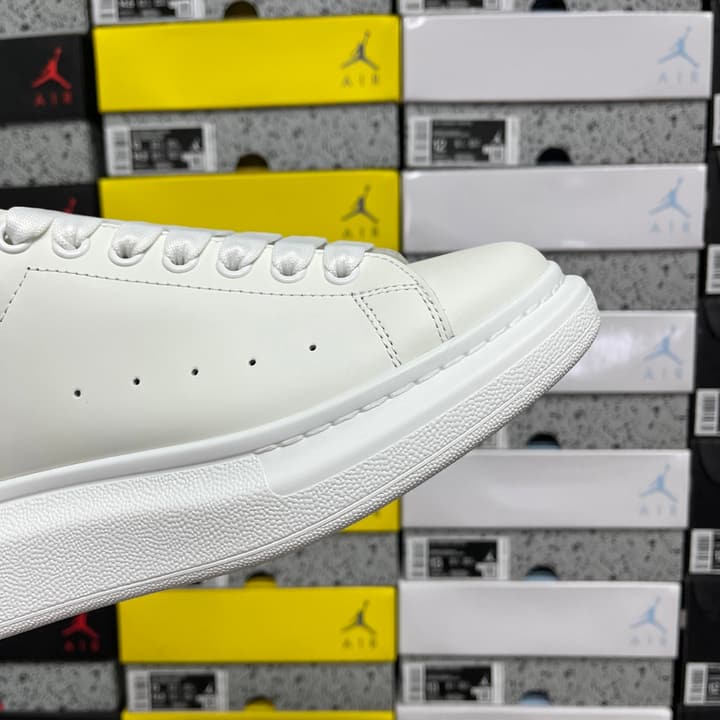Alexander McQueen Oversized Low-Top Sneakers in All Black With White Sole