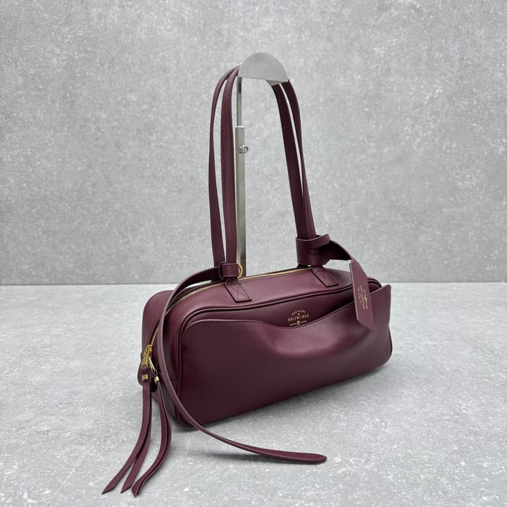 Balenciaga Carrie Leather Bowling Bag – Small in Burgundy