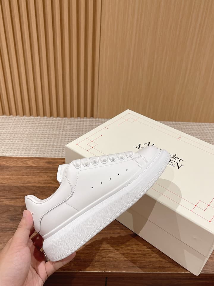 Alexander McQueen Classic Versatile White Sneakers in White With Black Laces & Heel