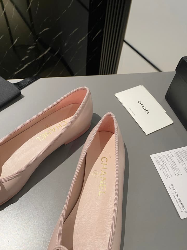 Chanel Classic Ballet Flats in Tan With Black Cap Toe