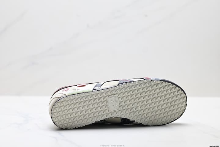 Onitsuka Tiger Mexico 66 Slip-On Casual Sneakers in Cream Black Stripes Graphic