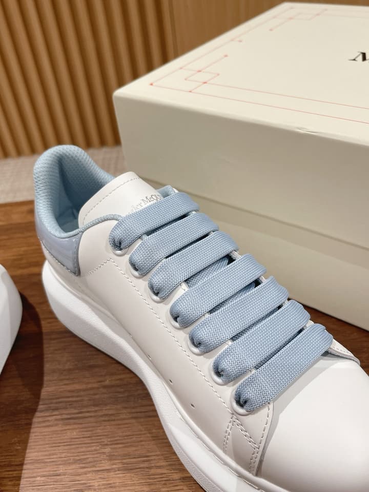 Alexander McQueen Classic Versatile White Sneakers in White With Black Laces & Heel