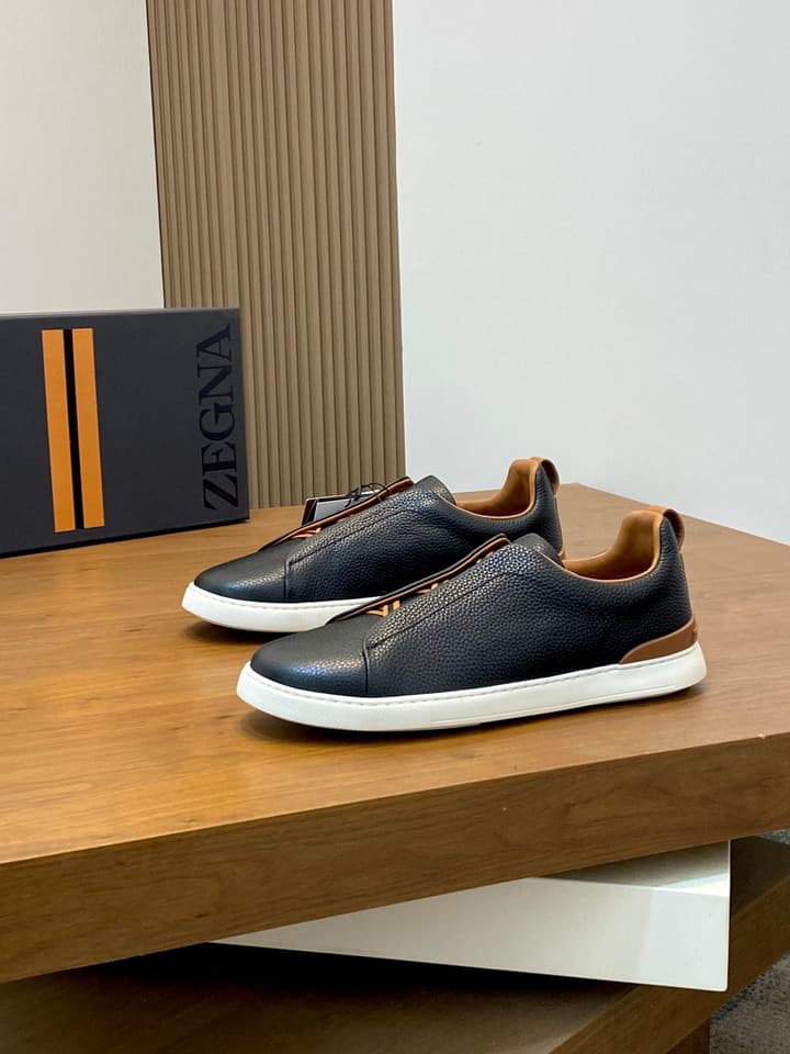 Ermenegildo Zegna Triple Stitch Sneakers in Black Leather With Brown Tag
