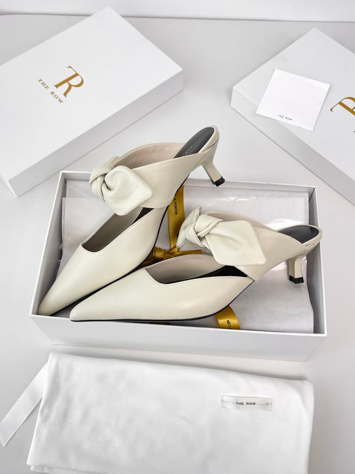 The Row Leather Bow Mules in Black Leather