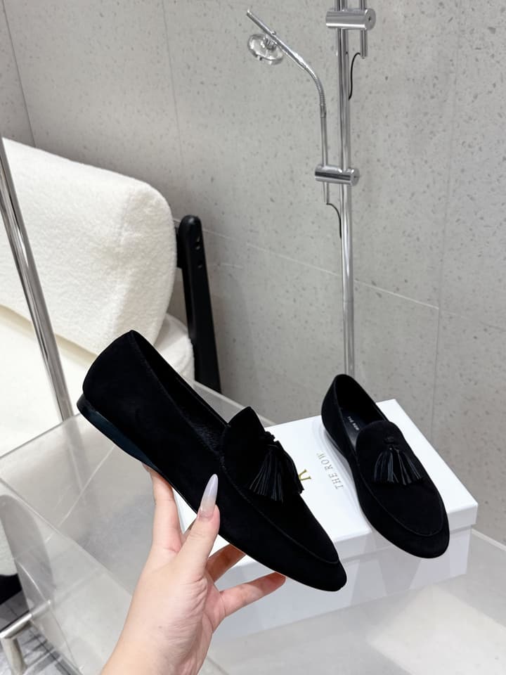 The Row Tassel Loafers in Black Suede