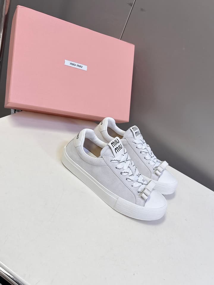 Miu Miu Distressed Retro Double Lace Sneakers in Red
