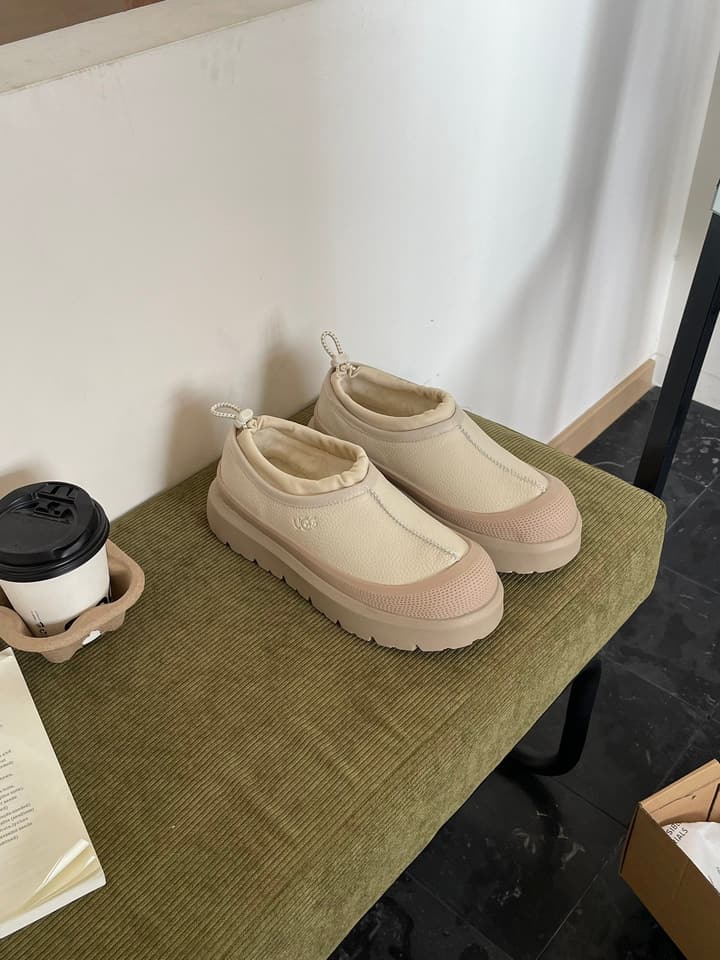 UGG Tasman Low-Top Leather Slippers in Black And Beige