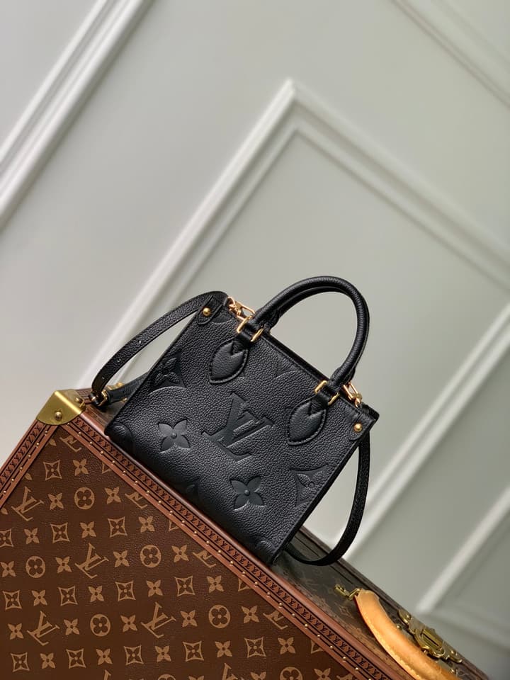 Louis Vuitton OnTheGo BB Monogram Empreinte Handbag in Beige And Cream Monogram
