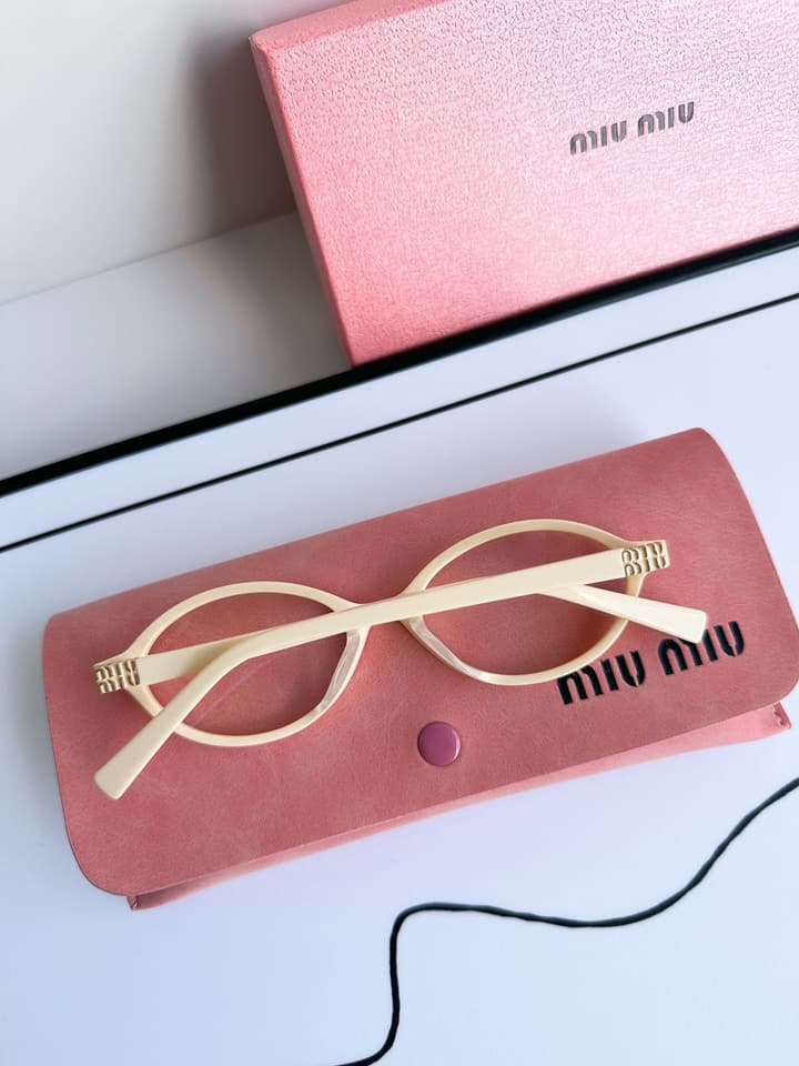 Miu Miu SMU04Z Black Frame Transparent Lens Sunglasses – 2023 Autumn/Winter Collection in Beige