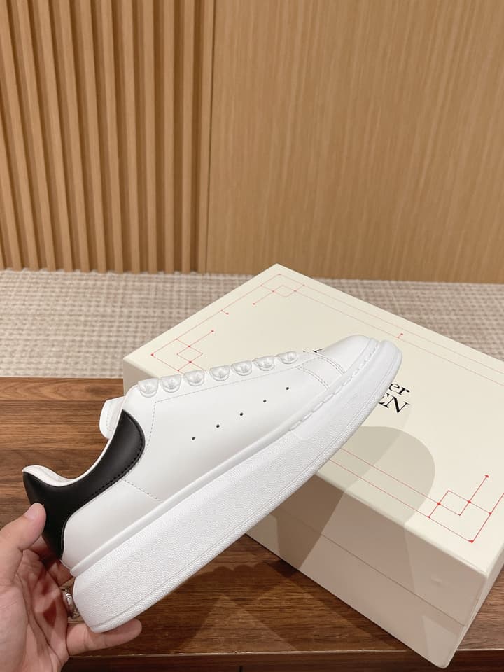 Alexander McQueen Classic Versatile White Sneakers in White With Black Laces & Heel