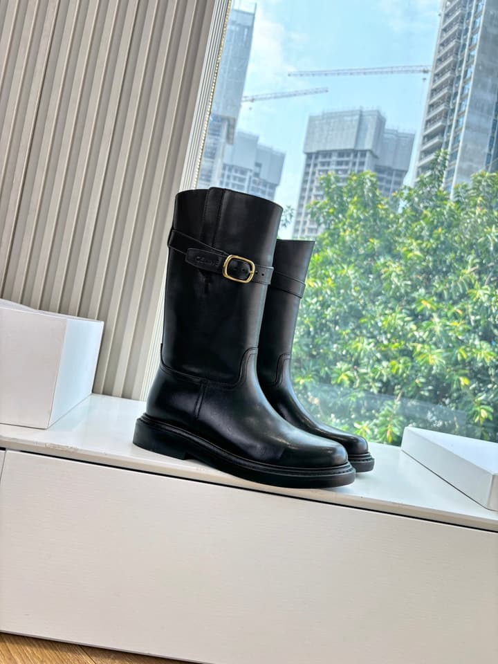 Celine Triomphe Knight Ankle Boots – 2025 Fall/Winter Collection in Black And Brown Leather Display