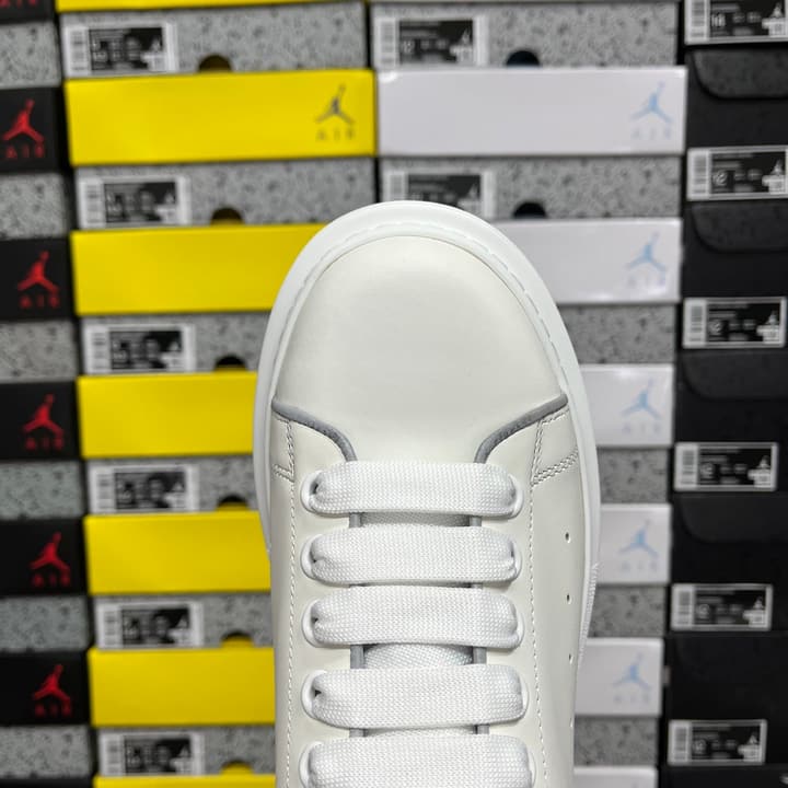 Alexander McQueen Oversized Low-Top Sneakers in All Black With White Sole
