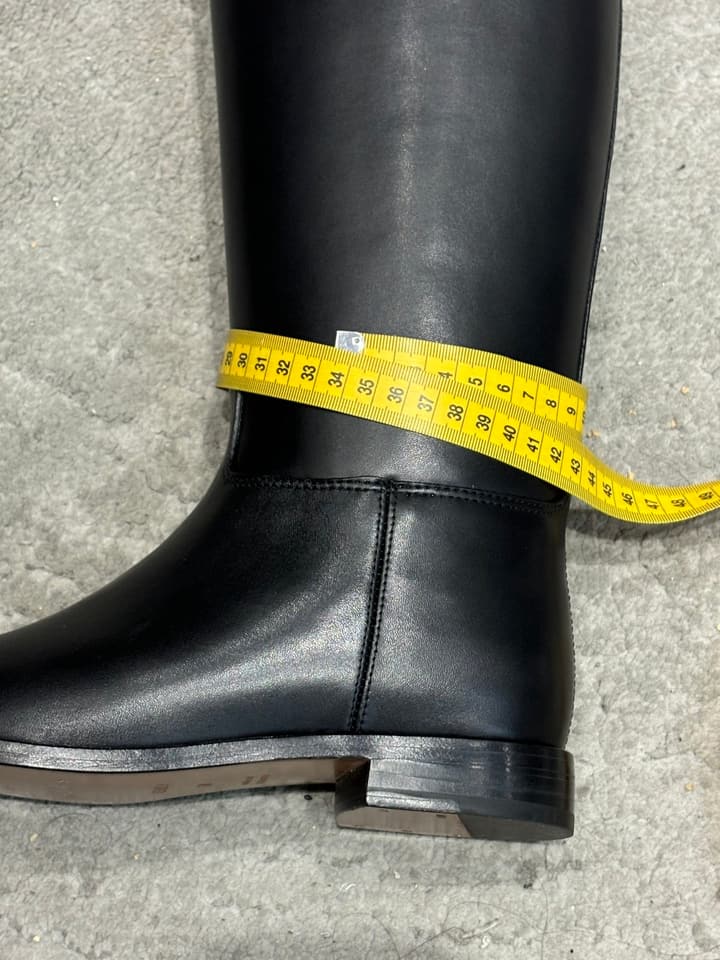 Hermès Classic Knee-High Boots – 2025FW in Assorted Buckle Riding Boots Display