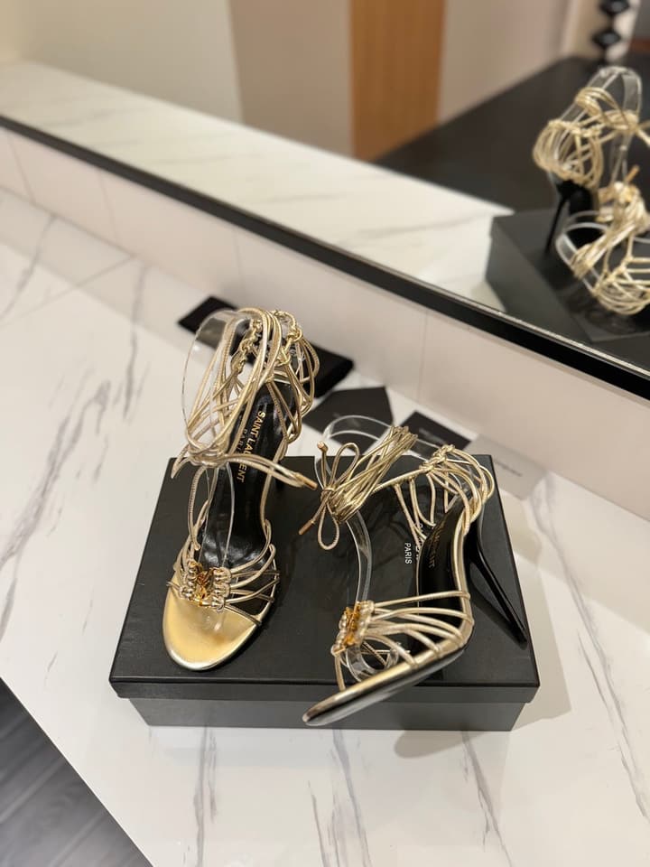 Saint Laurent Letter Buckle Pumps in Bright Gold