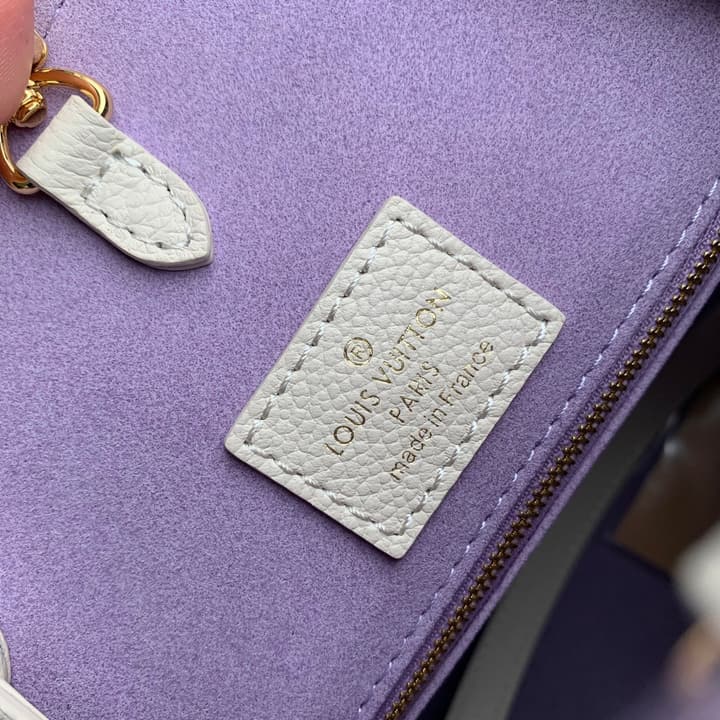 Louis Vuitton ONTHEGO Medium Tote Bag in Cream/white Monogram With Lilac Print