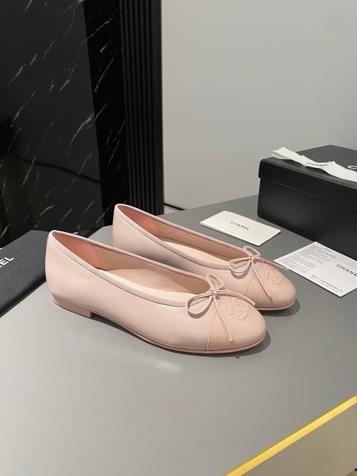 Chanel Classic Ballet Flats in Tan With Black Cap Toe