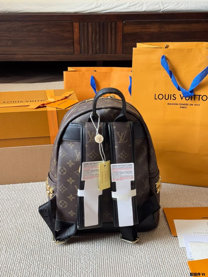 Louis Vuitton Monogram Mini Backpack in Monogram With Light Blue Charm