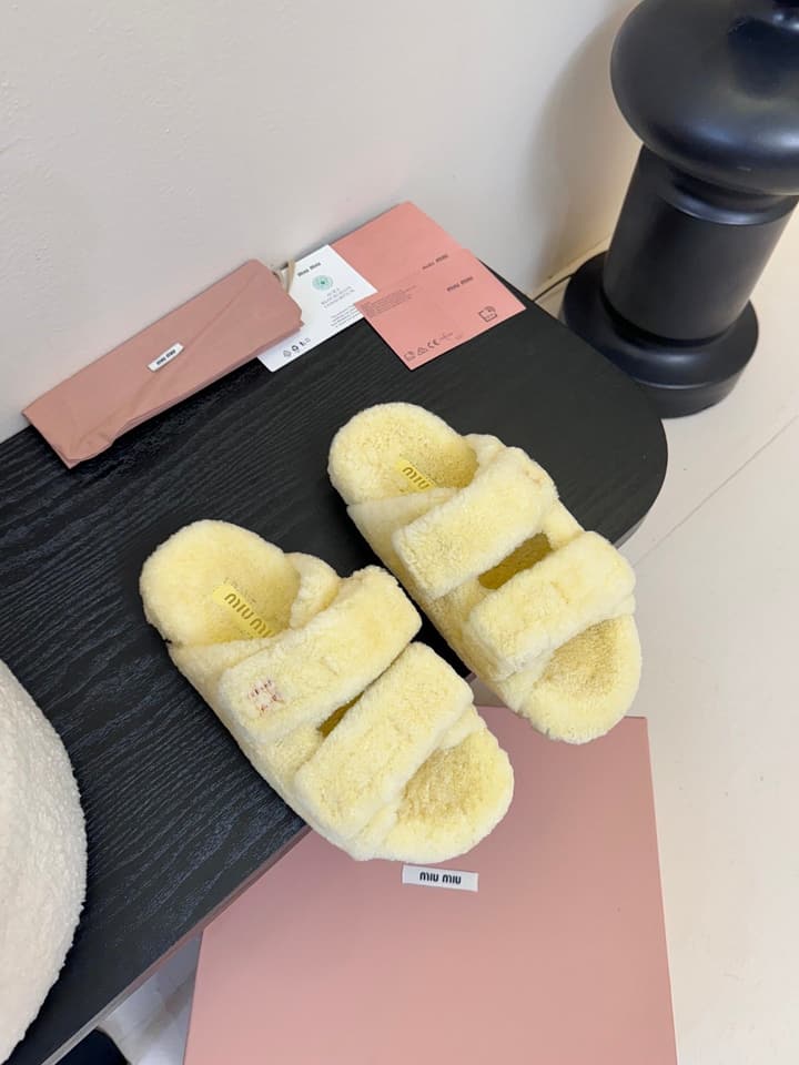 Miu Miu Sheepskin Mules in Black