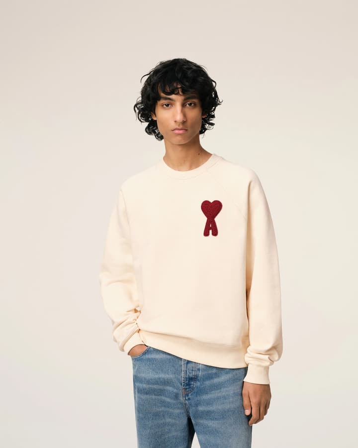AMI Paris Ami de Coeur Raglan Crewneck Sweatshirt – 25FW in Apricot With Clear Heart