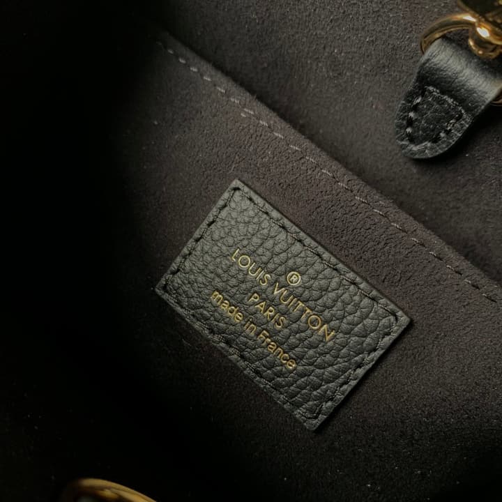 Louis Vuitton OnTheGo BB Monogram Empreinte Handbag in Beige And Cream Monogram