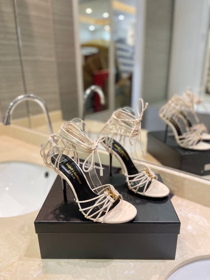 Saint Laurent Letter Buckle Pumps in Bright Gold
