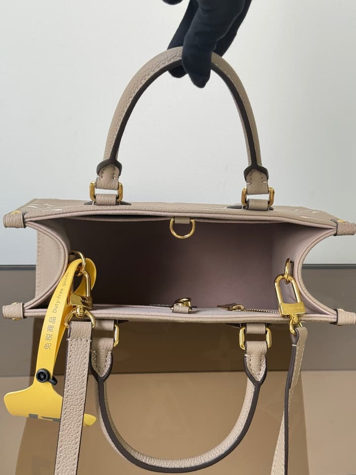 Louis Vuitton OnTheGo Small Handbag in Elephant Grey Monogram