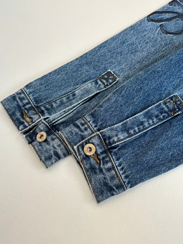Loewe Embroidered Washed Distressed Denim Jacket in Washed Black
