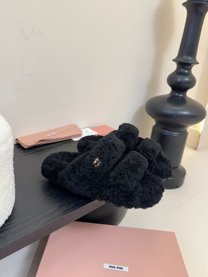 Miu Miu Sheepskin Mules in Black