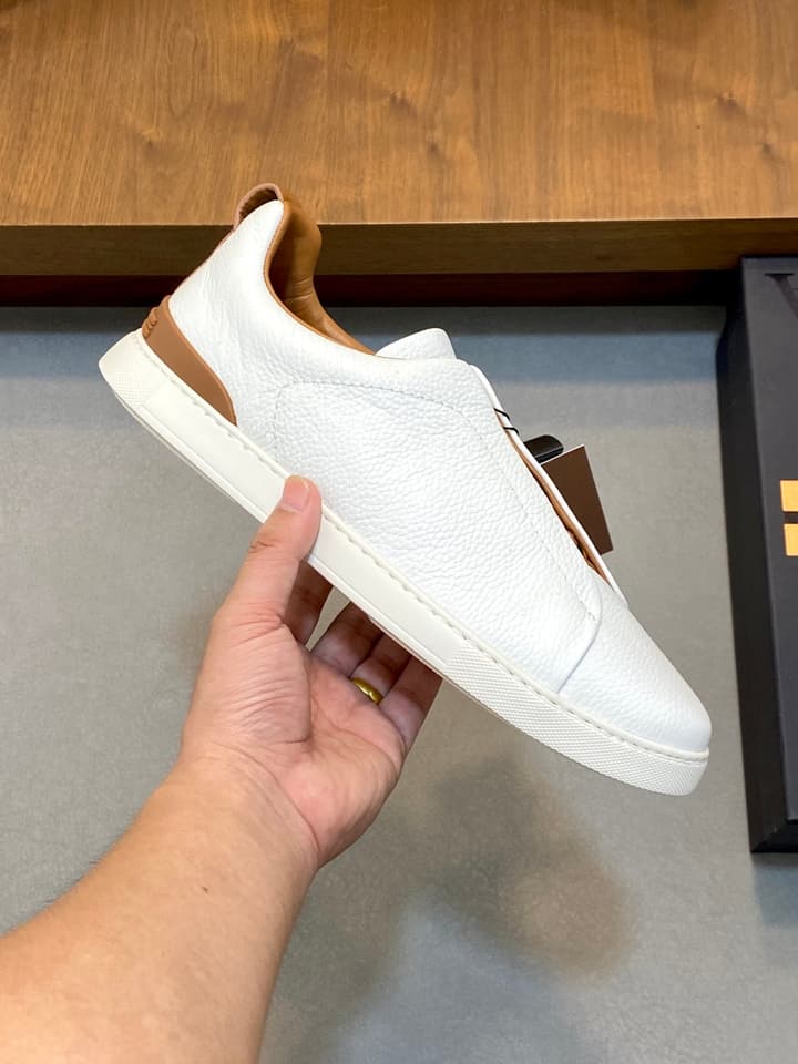 Ermenegildo Zegna Triple Stitch Sneakers in Black Leather With Brown Tag